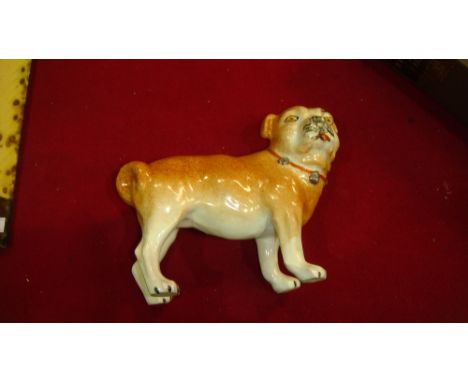 Vintage Staffordshire dog ornament in the form of a Pug (good condition crazing underneath)
