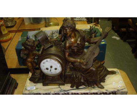 Early 20th century continental spelter mantle clock depicting Romance on marble plinth