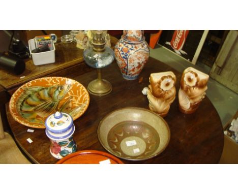 Assorted decorative china including studio pottery bowl, fish dish, paraffin lamp, garniture vases etc.