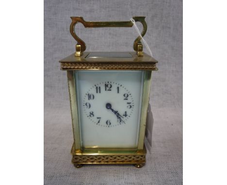 AN EDWARDIAN BRASS CASED CARRIAGE CLOCK, 12.5 cm high