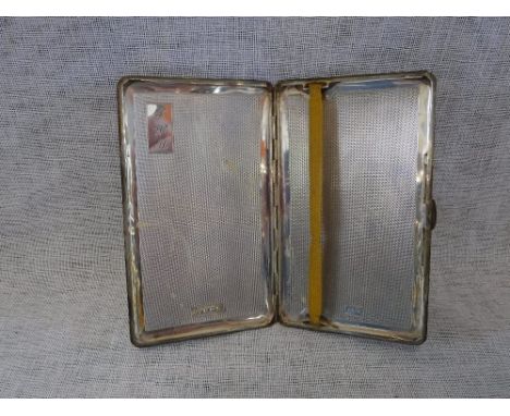 A SILVER ENGINE-TURNED CIGARETTE CASE (c. 4 t oz)