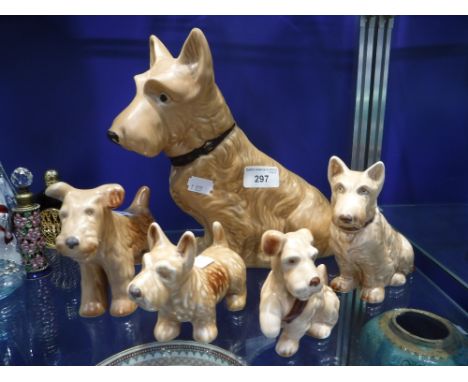 A SYLVAC SCOTTIE DOG (1208), 24 cm high and other similar smaller Scottie dogs (6)