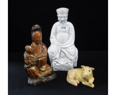 AN ORIENTAL WHITE GLAZED CERAMIC STUDY OF A GENTLEMAN, a Chinese ceramic study of a wild boar and a  carved wooden study of a
