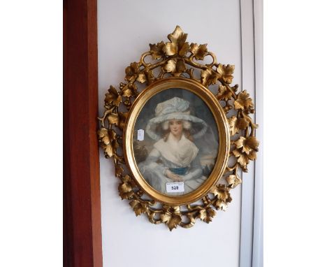 A PAIR OF FLORENTINE GILT WOOD OVAL PICTURE FRAMES containing mezzotint portraits 