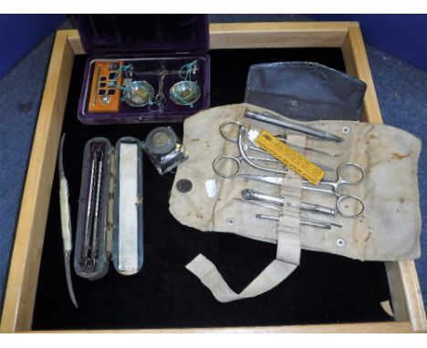 A VINTAGE MILITARY MEDICAL KIT and similar items