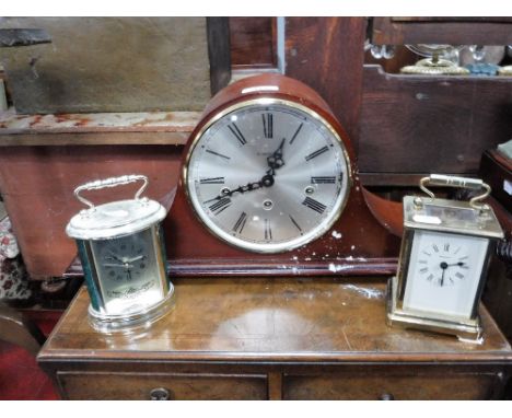  A MANTLE CLOCK, a brass-cased carriage clock and another similar