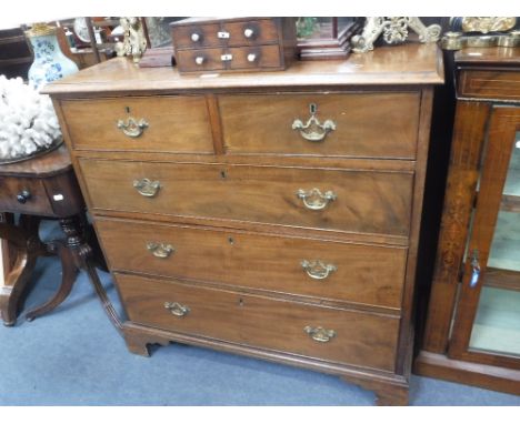 A 19TH CENTURY MAHOGANY CHEST OF DRAWERS on bracket feet, 95cms wide