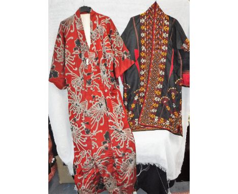 A VINTAGE KIMONO and a black housecoat with all over red, yellow and white geometric decoration (2)