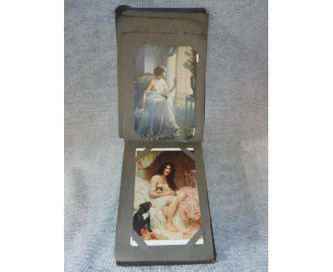 A VINTAGE POSTCARD ALBUM CONTAINING POSTCARDS OF NUDES, circa 1920s