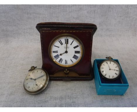 TEGRA: AN EIGHT DAY TRAVELLING CLOCK in a fitted leather travelling case and two pocket watches (3)