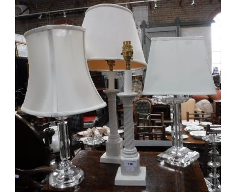 A PAIR OF CERAMIC LAMPS and two others