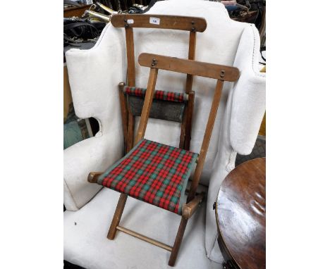 A PAIR OF VINTAGE FOLDING CHILD'S CHAIRS
