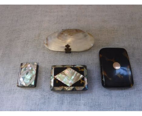 A MOTHER-OF-PEARL AND METAL VESTA CASE and a collection of similar items