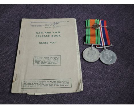 A pair of WW2 Medals, Defence and War to 301111 K Sharp ATS, married name Shields, Release Book and a ATS 9ct Sweetheart Broo