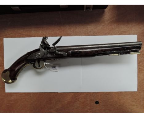 A Sea Service Flintlock Pistol with brass butt, cap no N31, brass trigger guard, tower mark, crown over GR, small crown and a