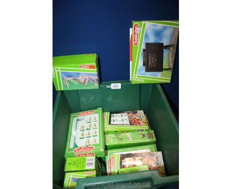 A modern set of Subbuteo including players, referees, football, goals, etc.