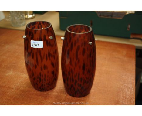 A pair of tortoiseshell patterned glass lamp Shades, 9'' tall.
