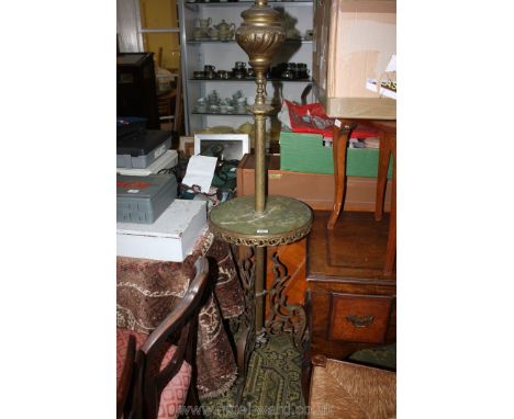 An ornate late 19th c. gilt Standard Lamp with inverted urn to the top on decorative cylindrical column with green marble cir