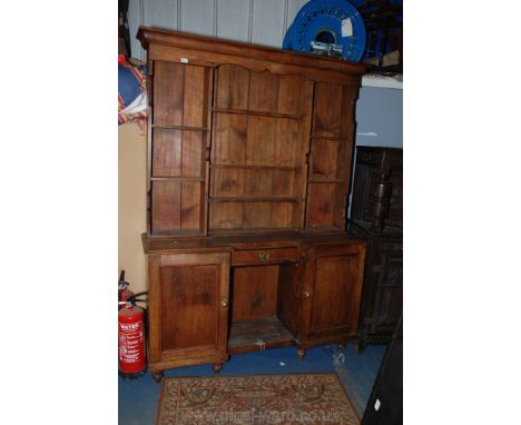 A 19th c. Oak country Dresser with three section, five shelf plate rack, cup hooks, breakfront base with single drawer and tw