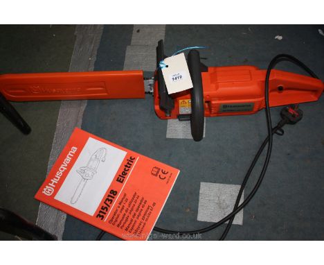 ***A Husqvarna 318, 240 volt Electric Chainsaw with 15" cutter-bar, NEEDS ATTENTION SOLD AS SEEN.