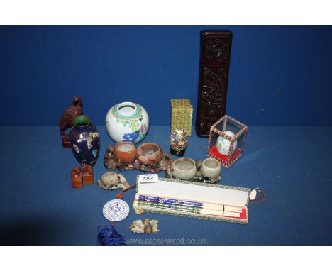 A box of Chinese items, soapstone carvings including seven mini monkeys, boxed cloisonne chopsticks, cloisonne butterfly vase