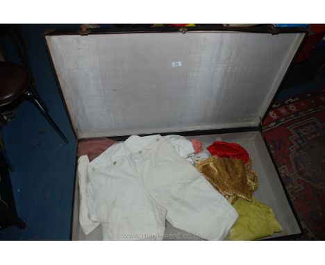 A large leather Trunk (41" x 24" x 6") with various vintage costumes