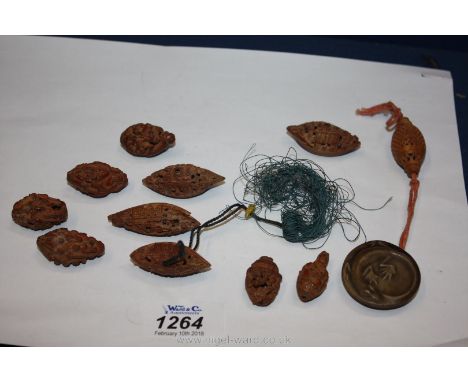 Miscellaneous Chinese carved wooden Beads and a glazed porcelain Button with salamander decoration
