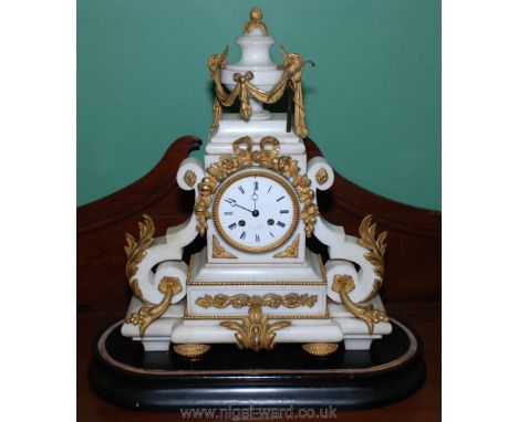 An elegant Alabaster/white marble cased Mantel Clock of French design having ormolu/gilt mounts, the face with a garland of f