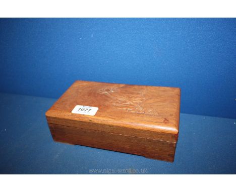 A small Chinese wooden Box with lid containing various playing cards