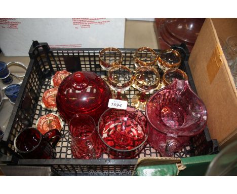 A quantity of red glass including cranberry cream jug (small chip), six ruby stemmed glasses, three small salts with spoons, 
