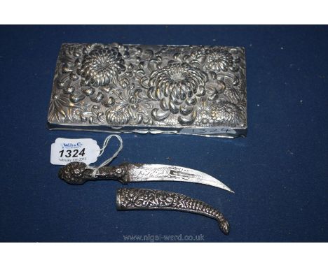 A miniature silvered Jambaya with ornate hilt and scabbard, 14 cms overall and a silvered box Lid with Chrysanthemum, possibl