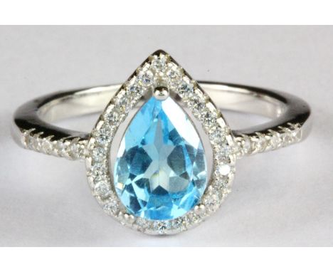 A 925 silver ring set with a pear cut Swiss blue topaz and white stones, (L).