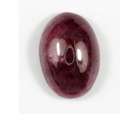 An unmounted cabochon cut star ruby, approx. 11.25ct, 1.6 x 0.6xm.