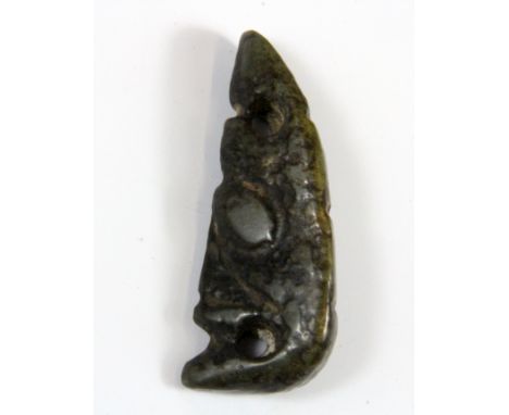 A Chinese carved archaic form jade head amulet, H. 6.5cm.