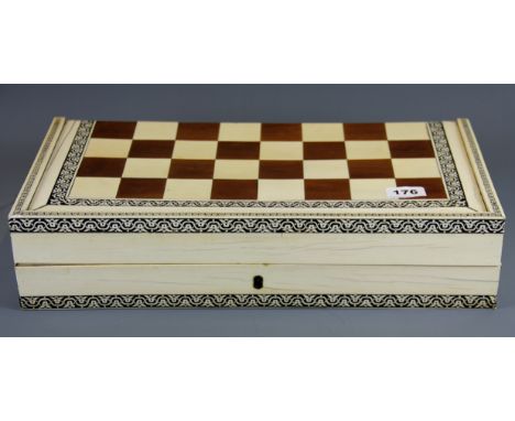 An early 19th Century Anglo-Indian ivory finished and inlaid chess and backgammon case. Size 46 x 23 x 10cm.