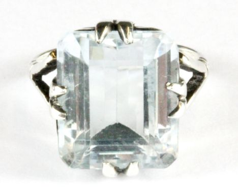 A  925 silver emerald cut blue topaz set ring, (M.5).