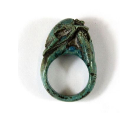 An early Egyptian turquoise glazed pottery scarab ring. (Prov. Samy collection).