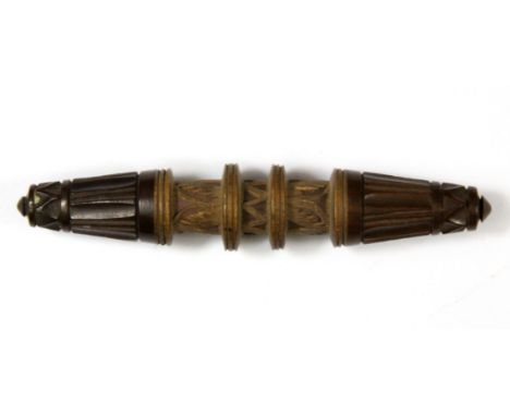 An Eastern carved wooden silk bobbin, L. 11.5cm.