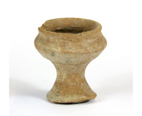 Early red clay Holy Land votive cup, circa 1000 BC, H. 5.8cm. (Prov. Samy collection).