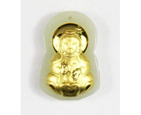 A small nephrite jade and gold faced Chinese Buddhist amulet, H. 3cm.