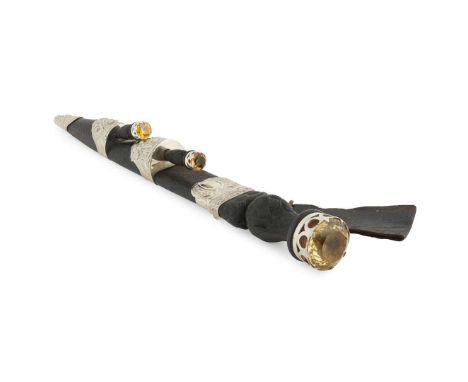  AN EARLY 20TH CENTURY DIRK EDINBURGH 1918 the basket weave ebony handle set with large facetted citrine in claw and arched g