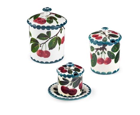  WEMYSS WARE THREE 'CHERRIES' PRESERVE JARS & COVERS to include a LARGE 'CHERRIES' PRESERVE JAR & COVER, glazed earthenware, 