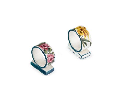  WEMYSS WARE TWO NAPKIN RINGS comprising; 'CABBAGE ROSES' NAPKIN RING, glazed earthenware, impressed maker’s mark WEMYSS, 6cm