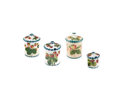  WEMYSS WARE FOUR 'STRAWBERRIES' PRESERVE JARS & COVERS to include a LARGE 'STRAWBERRIES' PRESERVE JAR & COVER, glazed earthe