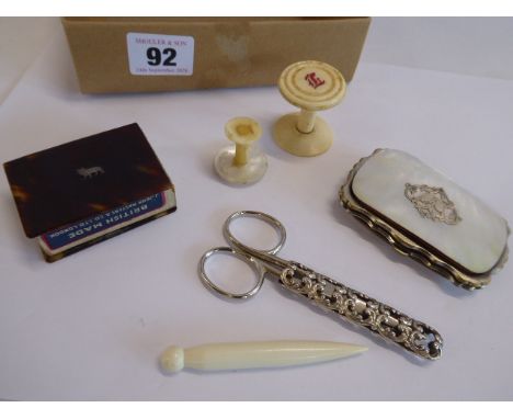 Mother of pearl purse, tortoiseshell matchbox holder, cotton bobbins, scissors in pierced silver sheath etc 