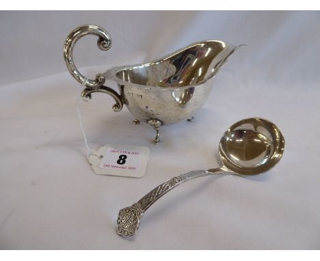 Silver sauce boat (Birmingham 1974) and a silver Celtic design sauce ladle (Sheffield 1976)