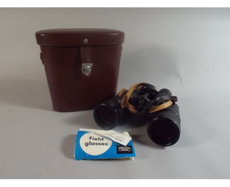 A Pair of Leather Cased Binoculars by Carl Zeiss Jena, Jenoptem 10X50W. In as new condition with Instruction Leaflet.