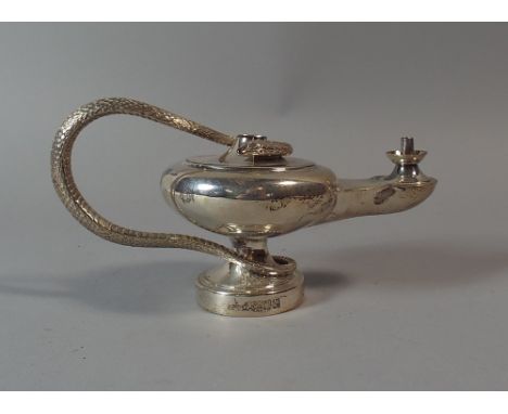 A George V Silver Novelty Table Lighter in The Form of An Aladdin Lamp with Snake Handle. London 1910. 196.4 gms.