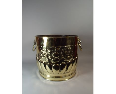A Very Large, Highly Polished Cylindrical Planter or Coal Bucket with Lion Mask Carrying Handles and The Body Decorated with 