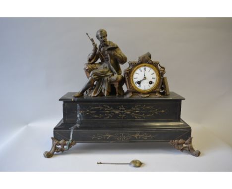 A French Black Slate Mantel Clock with Seated Artist Mount. Scrolled Ormolu Feet. 50cms Wide